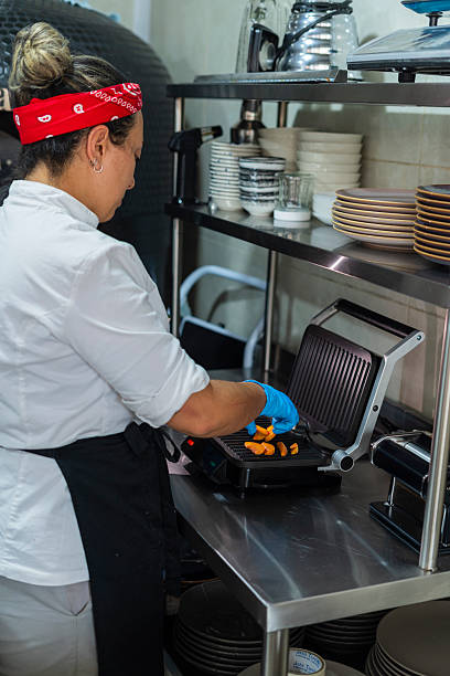 Chef prepares a delicious Italian burrata in the restaurant's kitchen