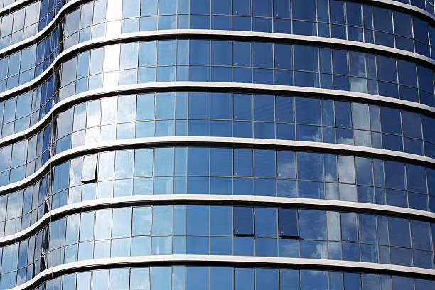 istock A striking building reflects the clear blue sky in its windows 2238977749