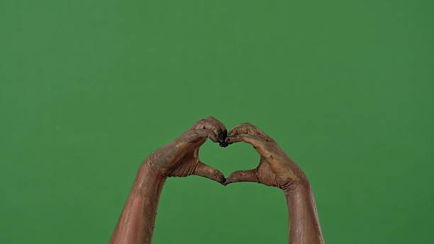 istock Creepy zombie hands make a heart sign 2238977967