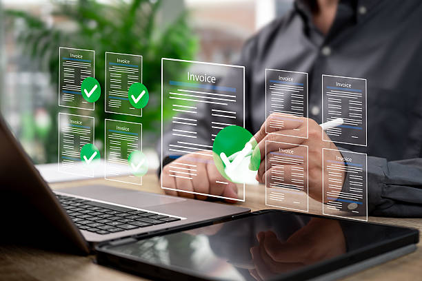 istock Invoice Digital Document Concept, Businessman Reviewing and Approving Online Invoice, Modern Paperless Office, Financial Transaction Verification, Smart Technology, Business Efficiency, Cost Reduction 2238979456