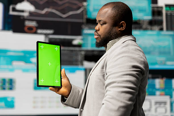 istock African american businessman using isolated mockup on gadget 2238981824