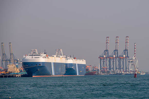 Large cargo container ship international shipping, logistics, and supply chain activities seaport, emphasizing import and export operations that support worldwide commerce.