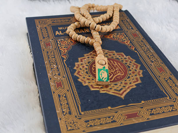 istock Holy Quran with arabic calligraphy 2238982801