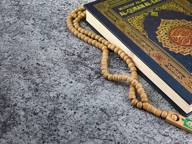 istock Holy Quran with arabic calligraphy 2238982824
