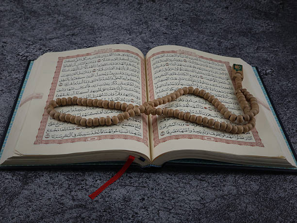 istock Holy Quran with arabic calligraphy 2238982839