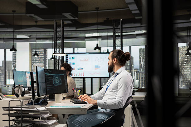 istock Male IT specialist uses AI neural networks for data sharing and digitalization 2238984299
