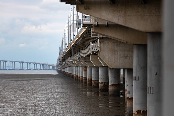 istock long bridge on the mud flat beach and sea 2238984376