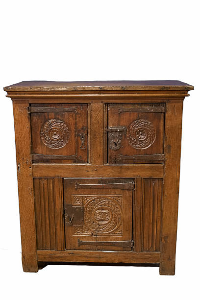 istock Rustic wooden cabinet with intricate carvings displayed against a plain background 2238990298