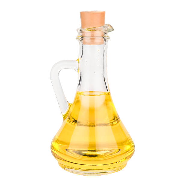 istock olive oil in glass bottle on white background, isolate. 2238991504