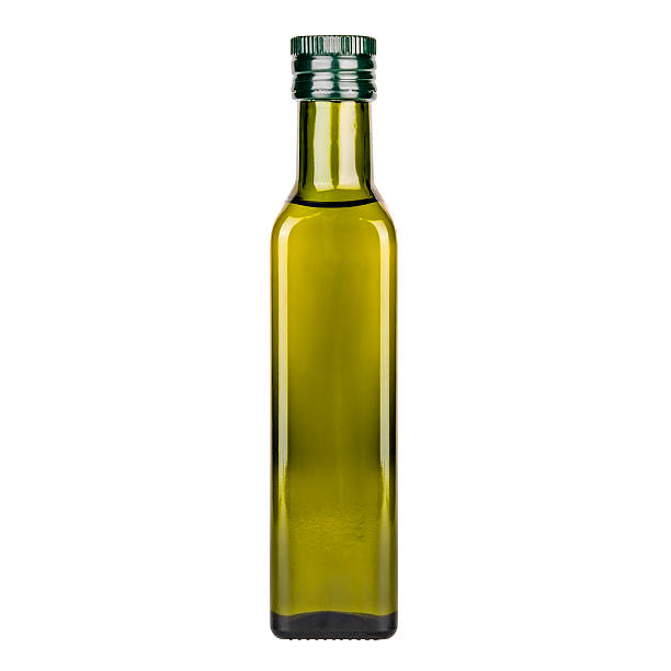 istock olive oil in glass bottle on white background, isolate 2238991526