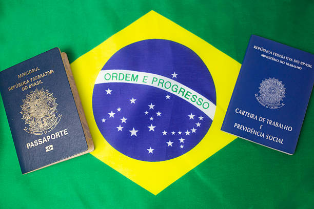 istock Brazilian work card and passport with brazil flag 2239009263
