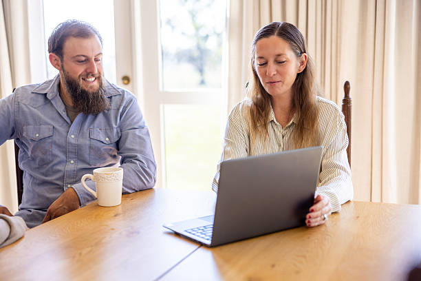 istock Couple meeting with financial adviser 2239016545