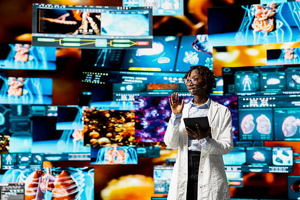 istock Female researcher doing key note presentation using holographic medical charts 2239039442