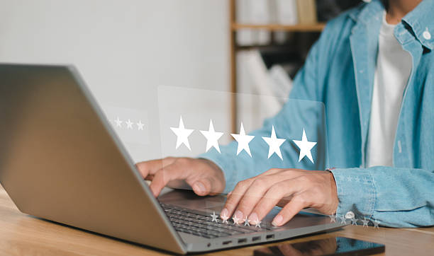 istock Experience excellent customer service, User give five star rating on online application, Positive feedback, Happy, Smiley face icon. Customer Reviews in Digital Survey, Satisfaction. 2239041139