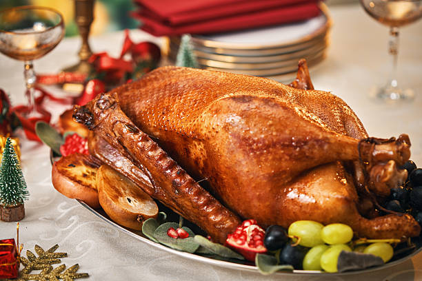 istock Roasted Holiday Goose with Vegetables for Christmas Dinner 2239042490