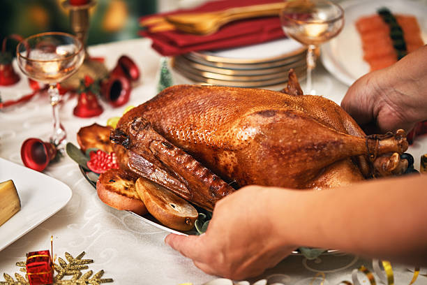 istock Roasted Holiday Goose with Vegetables for Christmas Dinner 2239042556