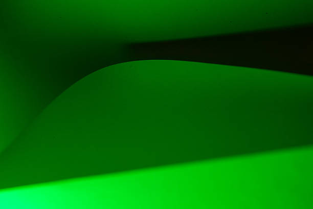 Abstract background showing curved lines creating dynamic shapes and shadows