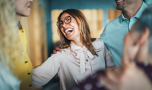 istock Cheerful team huddle in the office 2239048507
