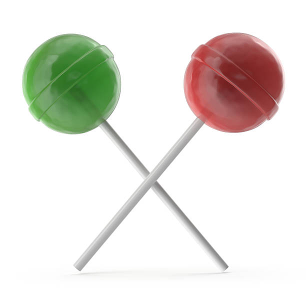 istock Two crossed lollipops green and red on white background 2239053901