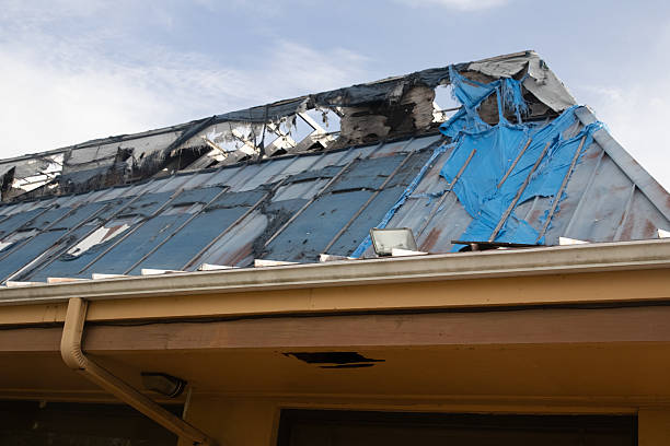 istock Roof damage left over from a Hurricane 2239054098