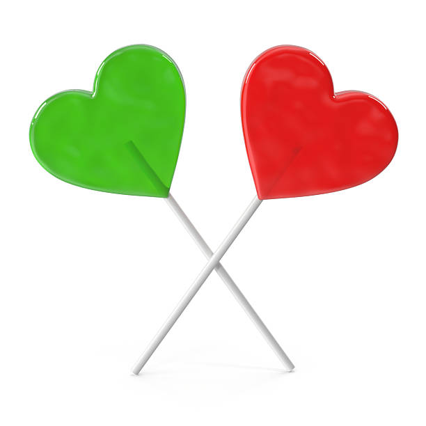 istock Heartshaped lollipops crossed green and red candy sweets 2239054169