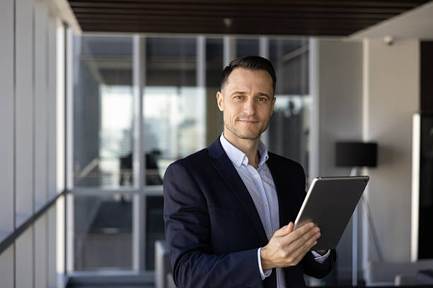 istock Positive confident young Hispanic CEO man posing for portrait 2239056214
