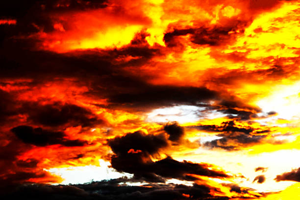 istock A breathtaking display of orange and yellow clouds 2239058344