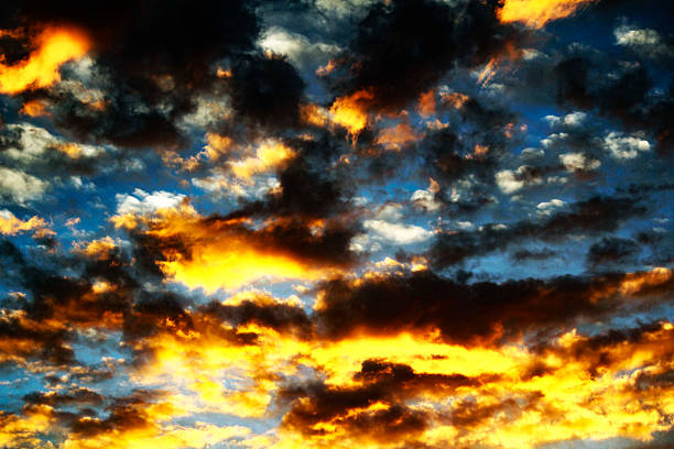 istock A breathtaking display of orange and yellow clouds 2239058345