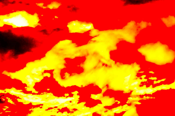 istock A breathtaking display of orange and yellow clouds 2239058363