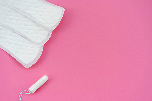 istock Sanitary Pads and Tampon on Pink Background 2239059099