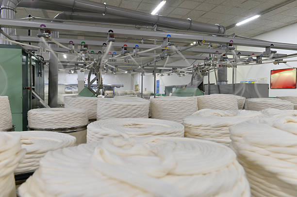 istock Cotton textile factory equipment is in operation 2239064060