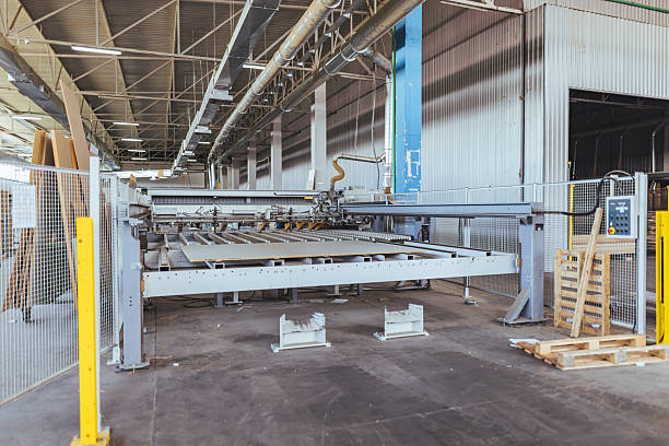 istock Large Industrial Machine in a Spacious Factory Setting with Metalworking Equipment 2239068227