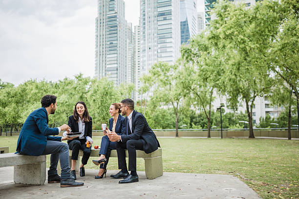 istock Business Meeting in Urban Park 2239068593