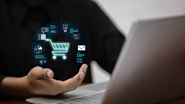 E-commerce Strategy  Shopping Cart Hub Above Laptop