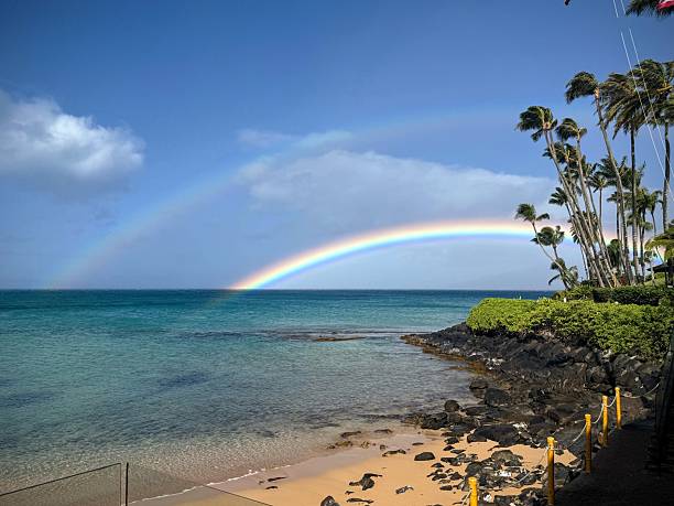 istock Vibrant Rainbow Over Hawaii Beach 2239095467