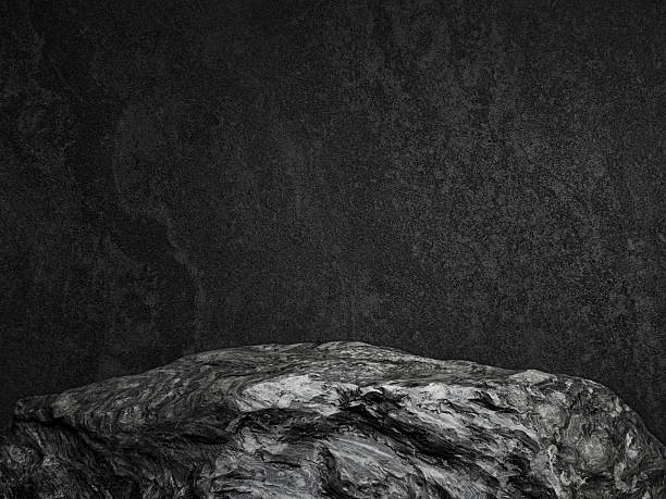istock Natural Dark Grey Stone Rock Podium or Presentation Display with dark black stone background for Product Showcase and Beauty Cosmetic Advertising. 2239096319