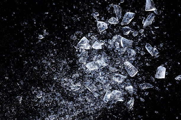 istock Ice cubes crushed on a black background. Chill backdrop. 2239101447