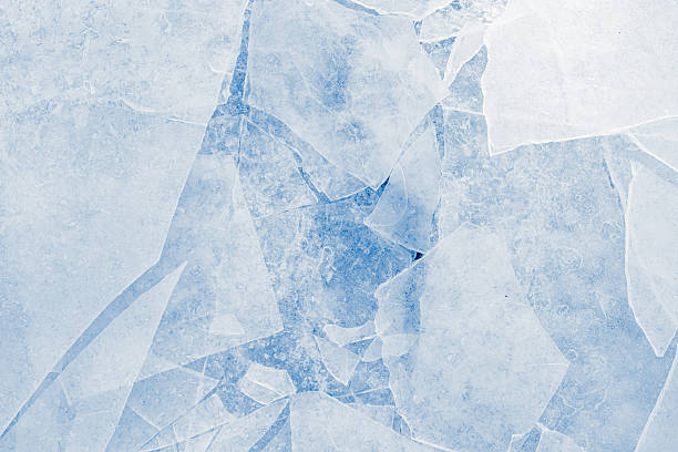 istock Shards of a crushed thin ice in a light-blue tones. Background texture. 2239101805