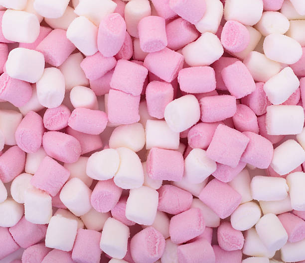istock Pink and white marshmallows background 2239102118