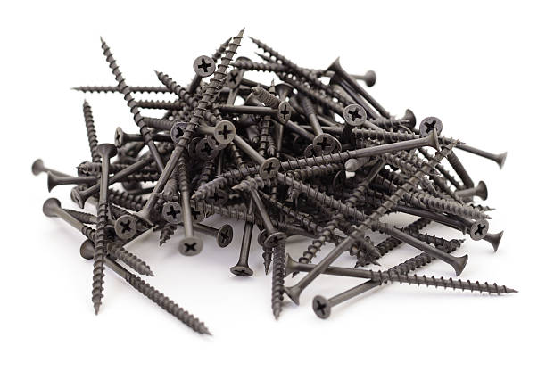 istock Black screws pile isolated on white background 2239102131