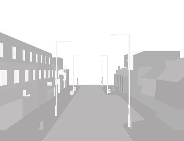 istock Empty street with buildings and glowing streetlights creates a timeless silhouette in a classic black and white town scene. 2239104464