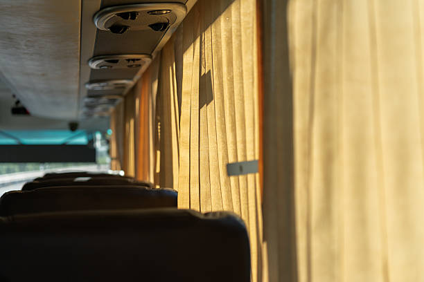 istock Curtains inside the bus filled with golden sunlight 2239110055