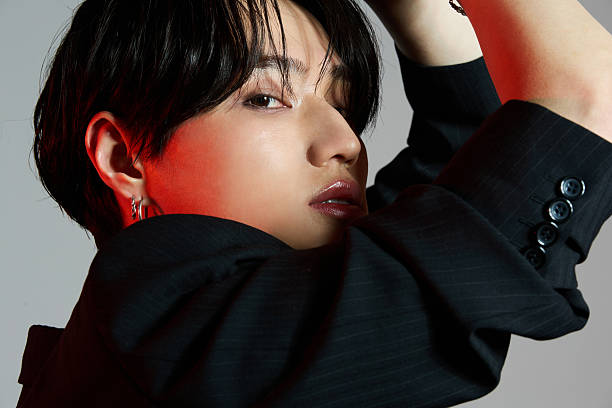 istock Portrait of a cool young Asian man with makeup 2239116656