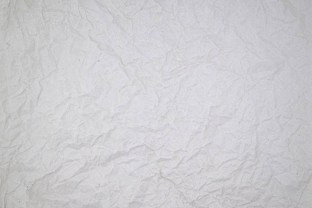 istock textured crumpled paper background, gray crumpled paper background 2239116956