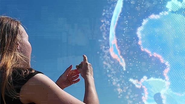 istock Woman examining an object in her hands 2239118578
