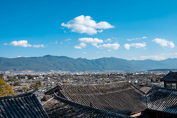 istock Lijiang Ancient Town and Distant Mountains in China 2239124151