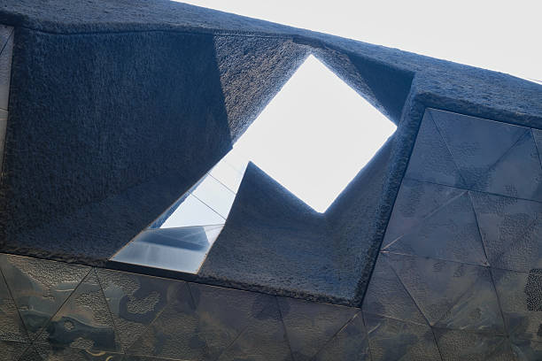 Glass pyramids used as a botanical gardens.  The still water makes for a great mirror.