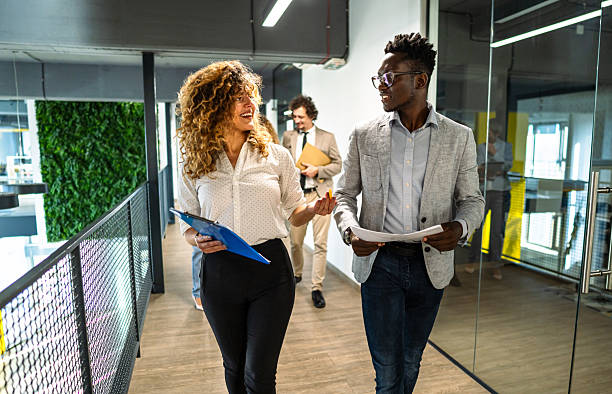 istock Diverse business people actively collaborating in modern office 2239128310