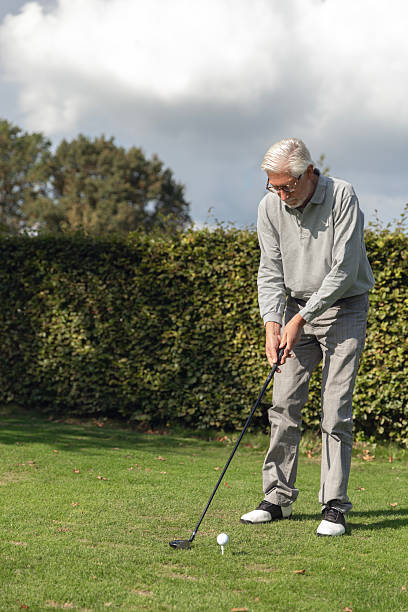 istock Senior retired man playing golf in Europe 2239132492