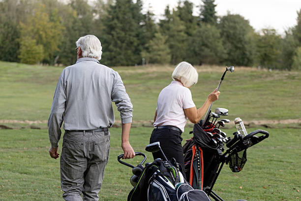 istock Senior retired couple playing golf in Europe 2239136728